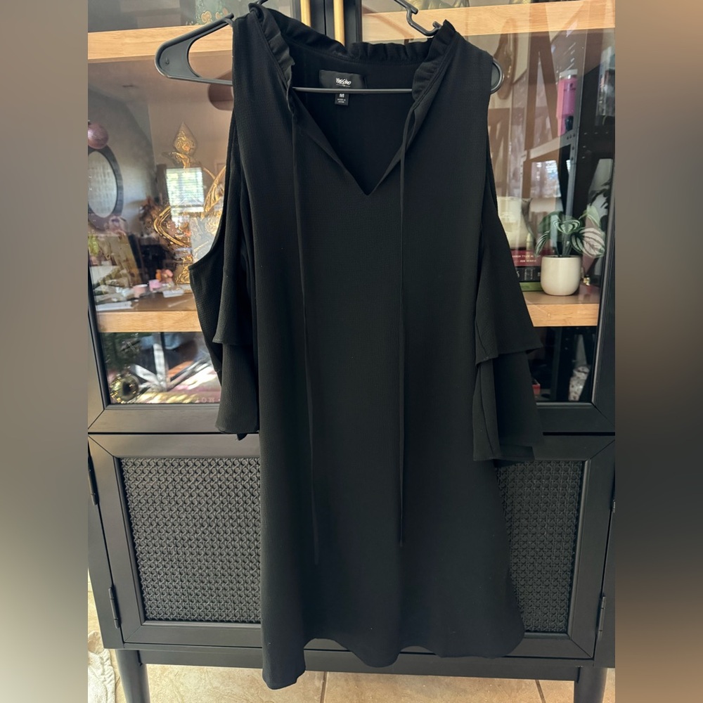 Black dress with shoulder cut outs.